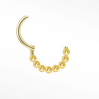 Cartilage hoop earrings by nina wynn featuring a handcrafted 14k yellow gold granulation design. This luxury clicker
