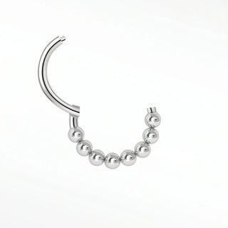 Cartilage hoop earrings in 14k white gold with a beaded granulation arc. Elevate your ear curation this modern textured