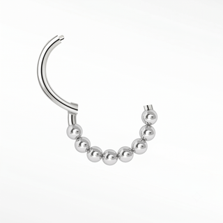 Cartilage hoop earrings in 14k white gold with a beaded granulation arc. Elevate your ear curation this modern textured