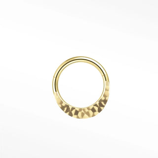 Cartilage hoop earrings in 14k gold with a hand-hammered celestial texture. Add organic light-reflecting facets