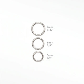 Cartilage hoop earrings with a handcrafted 18g hammered texture. Add an organic light-catching glow to your 14k white