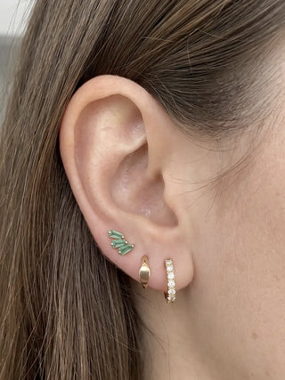 Cartilage hoop earrings showcasing a chic marquise shape. Made from premium 14k gold this 16g provides modern