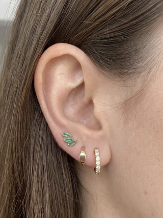 Cartilage hoop earrings showcasing a chic marquise shape. Made from premium 14k gold this 16g provides modern