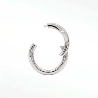 Cartilage hoop earrings showcasing a chic marquise shape. Made from premium 14k white gold this 16g provides modern