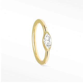 Cartilage hoop earrings by nina wynn featuring a brilliant marquise moissanite. Handcrafted in 14k gold