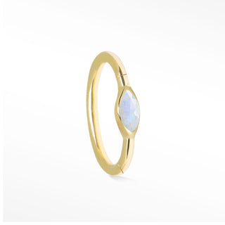 Cartilage hoop earrings featuring a high-brilliance marquise moissanite in 14k gold. Illuminate your ear stack