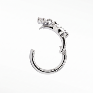 Cartilage hoop earrings in 14k white gold featuring a brilliant moissanite marquise. Experience maximum sparkle