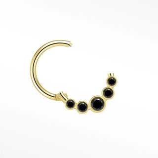 Cartilage hoop earrings featuring a bold sunburst of five bezel-set black diamonds in 14k gold. Introduce dark modern
