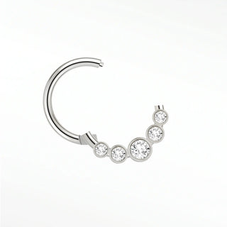 Cartilage hoop earrings by nina wynn showcasing a graduated arc of five lab-grown diamonds in 14k white gold.
