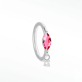 Cartilage hoop earrings in 14k white gold featuring a radiant pink sapphire and dangling charm. Feminine luxurious