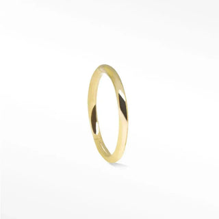 A sleek minimalist gold cartilage hoop earring with a polished finish in 14k gold by nina wynn
