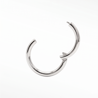 Cartilage hoop earrings in 14k white gold featuring a polished 18g finish. Refine your snug ear stack