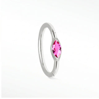 Cartilage hoop earrings highlighted by a gorgeous pink sapphire in marquise cut. Crafted 14k white gold this 16g offers