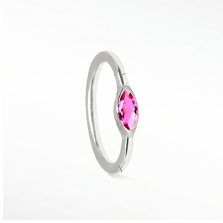 Cartilage hoop earrings highlighted by a gorgeous pink sapphire in marquise cut. Crafted 14k white gold this 16g offers