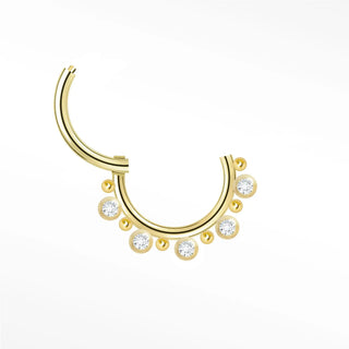 Cartilage hoop earrings in 14k gold with a graduated lab diamond crown. Crown your daith or septum this radiant