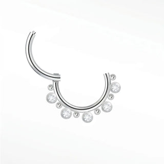 Cartilage hoop earrings in 14k white gold with a graduated lab diamond crown. Crown your daith or septum this radiant