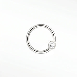 Cartilage hoop earrings by nina wynn featuring a brilliant lab-grown diamond in 14k white gold bezel setting.