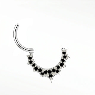 Cartilage hoop earrings in 14k white gold featuring a spiked black diamond pavé. Project bold rebellious sunburst