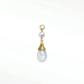 Ear charm crafted in solid 14k gold featuring a lustrous natural pearl and faceted moonstone briolette. Upgrade