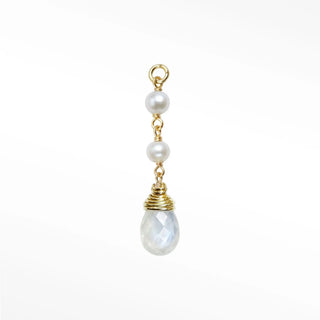 Ear charm crafted in solid 14k gold featuring a beautiful cascade of two natural pearls and faceted moonstone