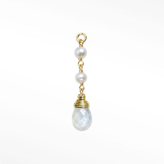 Ear charm crafted in solid 14k gold featuring a beautiful cascade of two natural pearls and faceted moonstone