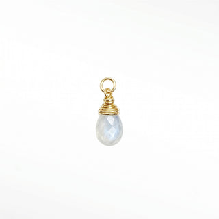 Ear charm crafted in solid 14k gold featuring a stunning faceted moonstone briolette. Upgrade your curation instantly