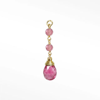 Ear charms designed with a tiered cascade of two faceted pink tourmaline beads and striking briolette drop. Easily