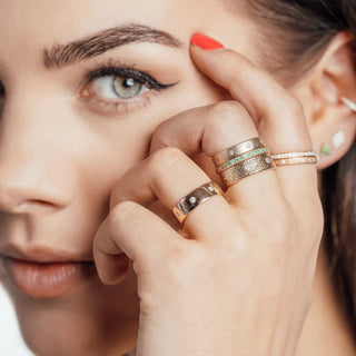 Discover the stunning cigar band ring with diamond accents crafted from 14k gold. Perfect for any occasion!