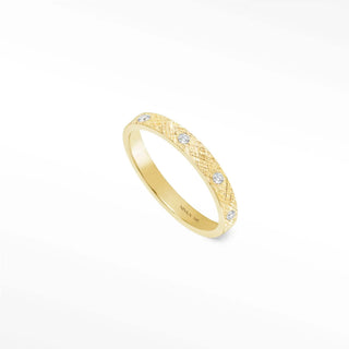 Delicate 14k gold cigar band ring featuring a textured woven pattern and four small round band ring diamonds