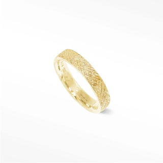 Elevate your style with this unique 14k gold ring. Its textured florentine pattern is eye-catching