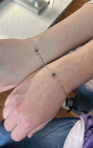 Classic infinity forever bracelet permanently welded onto a wrist in Denver.