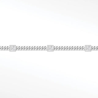 Silver chain bracelet with three 5mm square bezel diamonds in a sleek square bezel silver design for permanent jewelry
