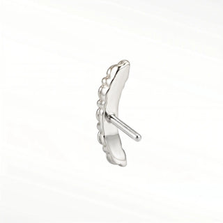 Elevate your style with dazzling diamond stud crafted in 14k gold. These ear climber