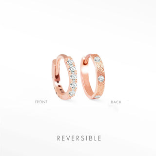 Diamond hoop earrings in 14k rose gold featuring reversible design with diamond side and textured side by Natalie Wynning