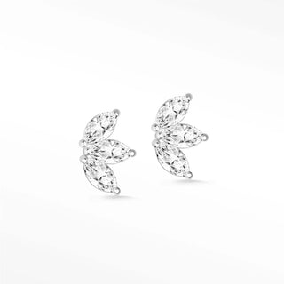 Delicate baby lotus diamond stud earrings in 14k white gold featuring three marquise-cut clear crystals