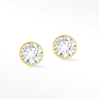 Gold-toned diamond stud earrings bezel 14k yellow featuring round clear faceted diamonds in sleek bezel settings