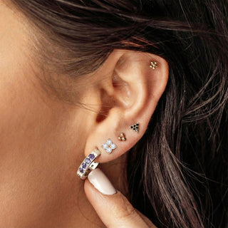 Gold-toned triangular stud earrings with black gemstones complementing diamond stud earrings clover 14k white design
