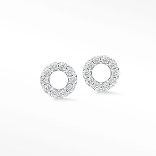 Delicate donut diamond stud earrings in 14k white gold with a sparkling halo of round-cut diamonds