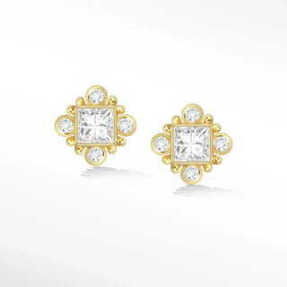 Gold stud earrings with a central princess cut diamond surrounded by smaller round diamonds in 14k gold
