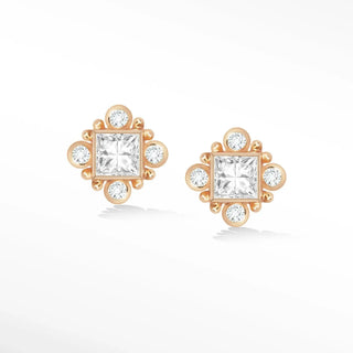 Princess cut diamond studs in 14k rose gold with a central square diamond surrounded by smaller round diamonds and metal accents