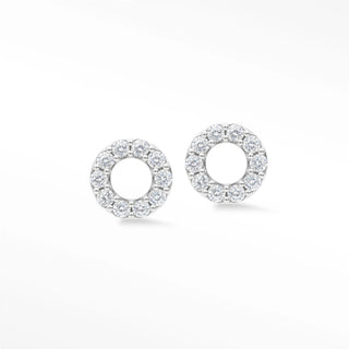 Delicate donut diamond stud earrings in 14k white gold with a sparkling halo of round-cut diamonds