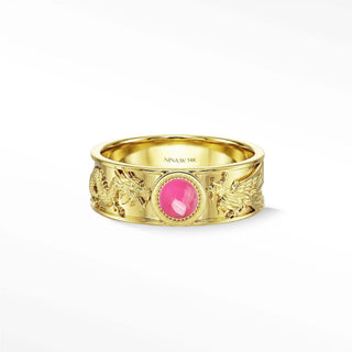 Gold band dragon phoenix ruby ring with intricate angel engravings and central natural pink ruby cabochon gemstone