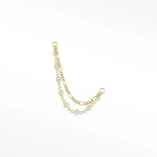 Ear chain connector featuring a tiered double-strand design with classic figaro links and sparkling bezel-set diamonds.