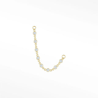 Ear chain perfection. Nina wynn’s tiny prismatic blends fine 14k gold with micro-diamonds for a subtle brilliant drape.