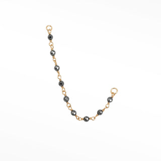 Ear chain from nina wynn’s rock candy collection. Discover a vibrant rainbow-like shimmer of natural faceted pyrite