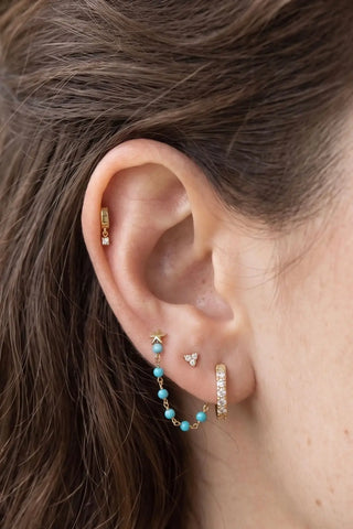 Ear chain by nina wynn. The prismatic emerald collection showcases vivid regal green precious stones in 14k yellow