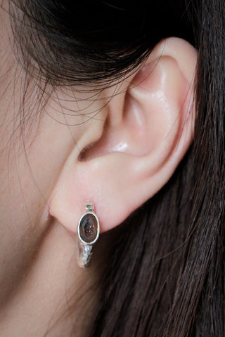 silver hoop earrings mini geode element, worn on ear for everyday styling