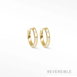 Ellie diamond 14k yellow gold reversible huggies 13mm gold hoop earrings with three clear round-cut stones on outer curve