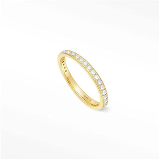 Delicate moonstone eternity band Thea with a 14k gold band featuring a continuous line of sparkling diamonds