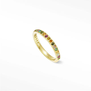 Thea tourmaline eternity band 14k gold features a delicate yellow gold band with vibrant multicolored tourmaline gemstones
